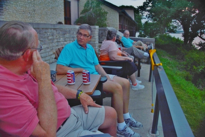 on the terrace at Deer Creek Lodge overlooking the lake
